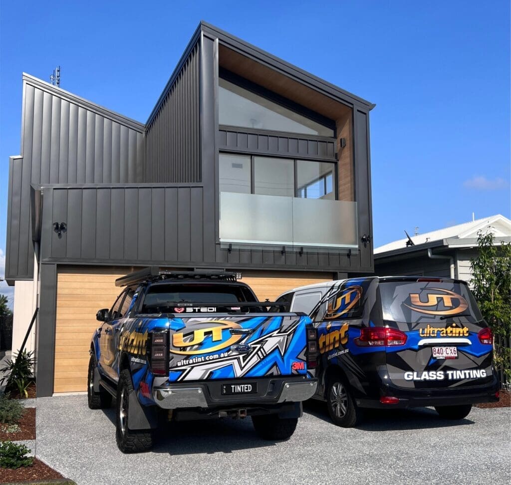 The Ultratint team tinting the windows of a home on the Gold Coast